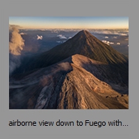airborne view down to Fuego with Acatenango behind